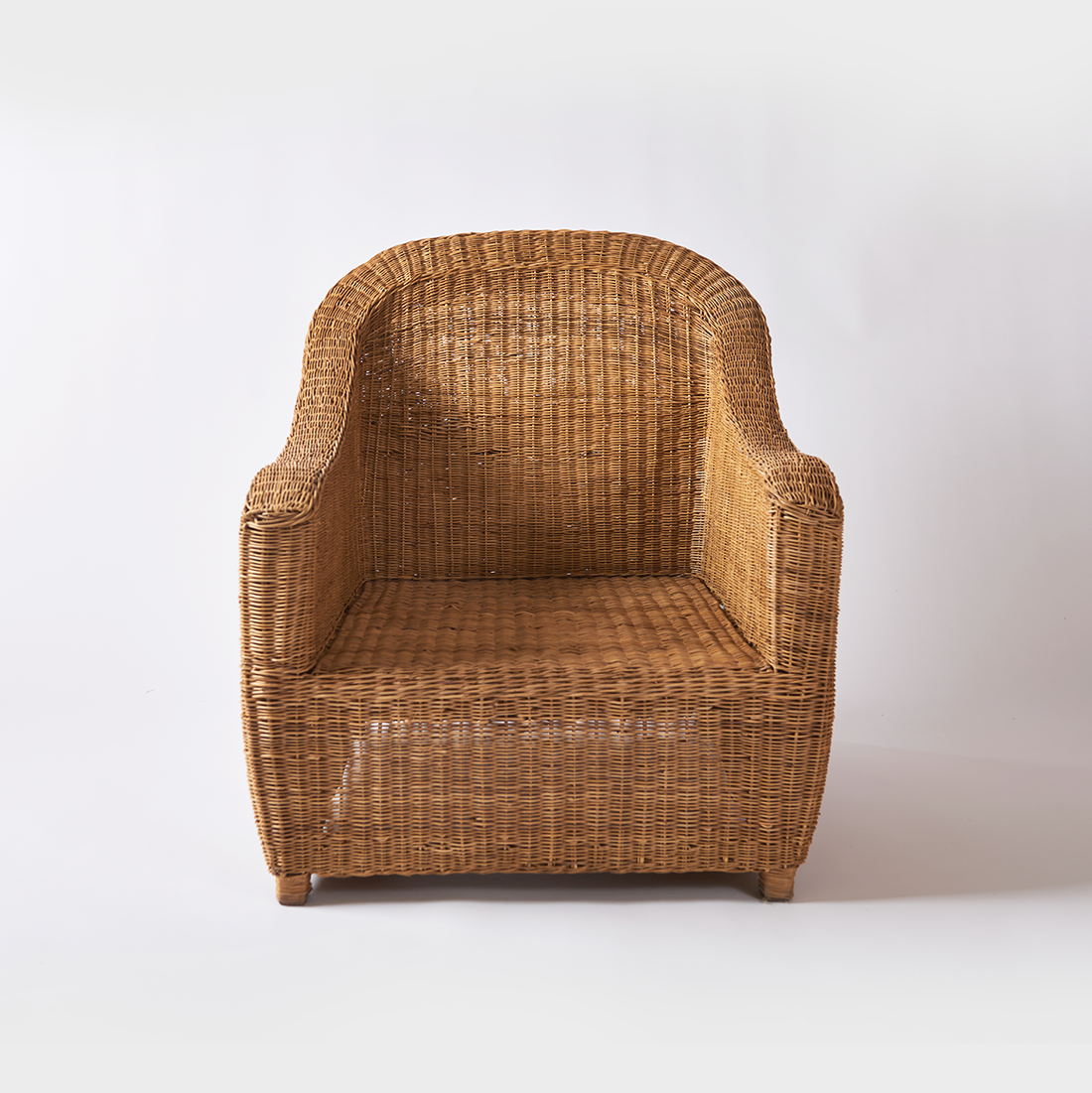 Relaxed one seater cane couch premium