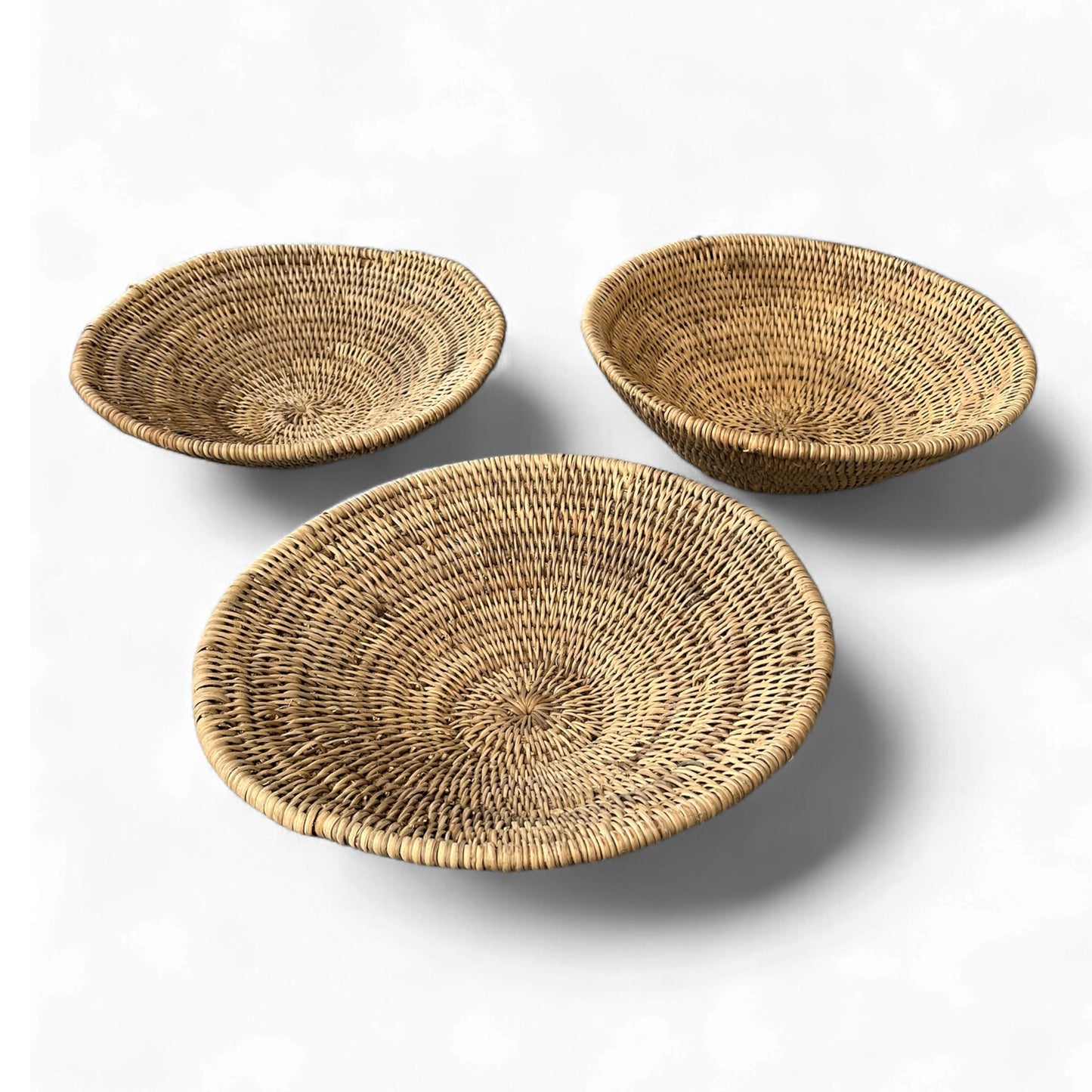 the Buhera Dish elevates any space with its natural charm and functionality. Whether used as a decorative accent or for storage, it adds an organic touch to your home. Perfect for everyday items and throws, displaying on a wall, or holding fruits and vegetables, the Buhera Dish is a stunning addition to your home.