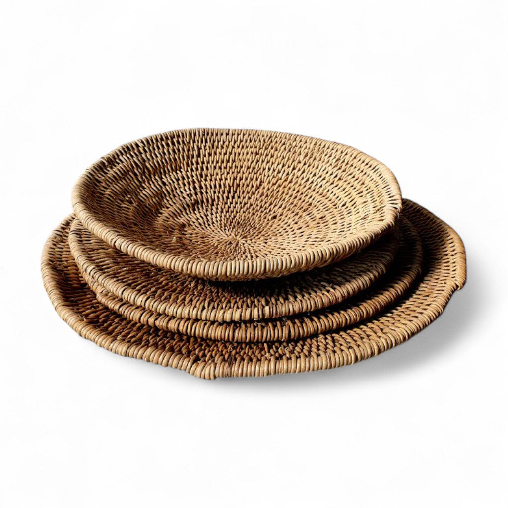 the Buhera Dish elevates any space with its natural charm and functionality. Whether used as a decorative accent or for storage, it adds an organic touch to your home. Perfect for everyday items and throws, displaying on a wall, or holding fruits and vegetables, the Buhera Dish is a stunning addition to your home.