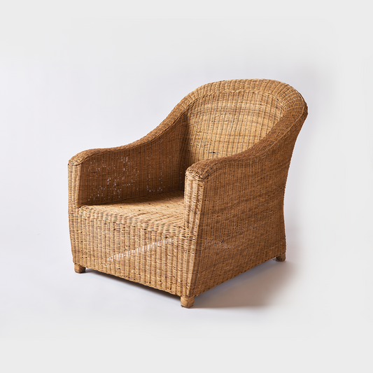 Relaxed one seater cane couch premium