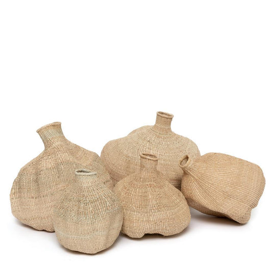 Handwoven Garlic Gourd Basket! Made by skilled Ndebele women weavers in Zimbabwe, each basket is one-of-a-kind and supports their livelihood. These decorative baskets are perfect for adding natural materials to your interior.