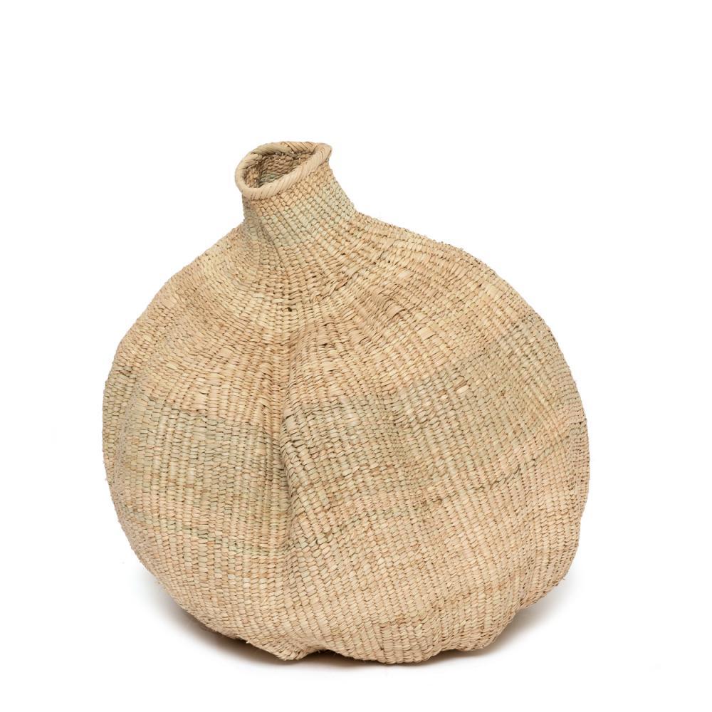 Handwoven Garlic Gourd Basket! Made by skilled Ndebele women weavers in Zimbabwe, each basket is one-of-a-kind and supports their livelihood. These decorative baskets are perfect for adding natural materials to your interior. 