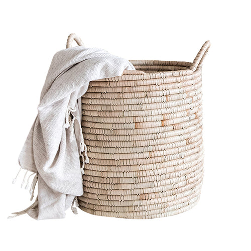 Experience both function and beauty with our Planter Baskets, handwoven from the ilala palm. With a variety of sizes and weave options, you are sure to find the perfect natural storage and container pieces for your home. Whether for blankets, laundry, plants, or toys, these baskets keep your space organised and stylish.