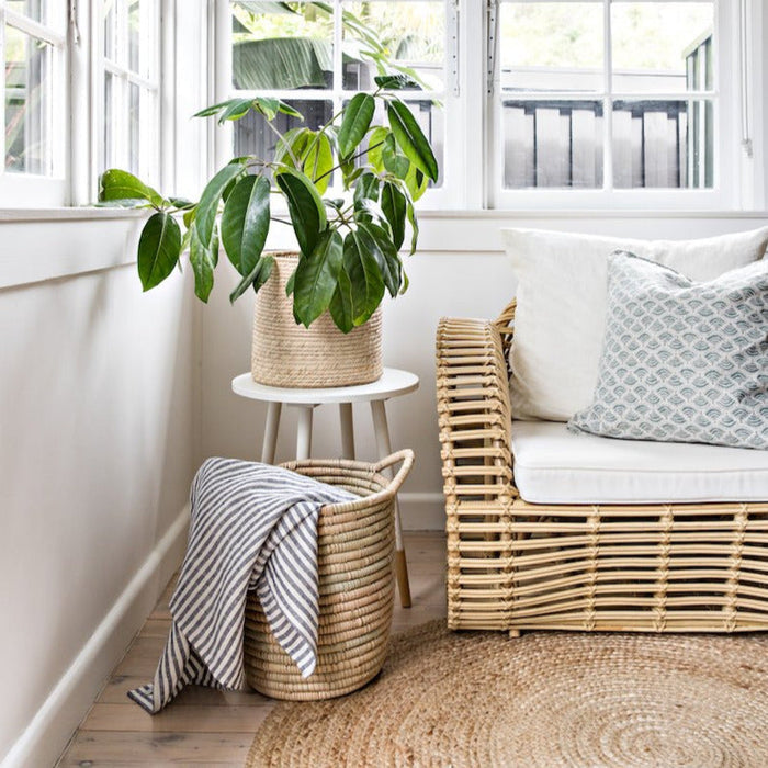 Experience both function and beauty with our Planter Baskets, handwoven from the ilala palm. With a variety of sizes and weave options, you are sure to find the perfect natural storage and container pieces for your home. Whether for blankets, laundry, plants, or toys, these baskets keep your space organised and stylish.