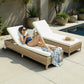 Woman relaxing on a wicker sun lounger by a poolside