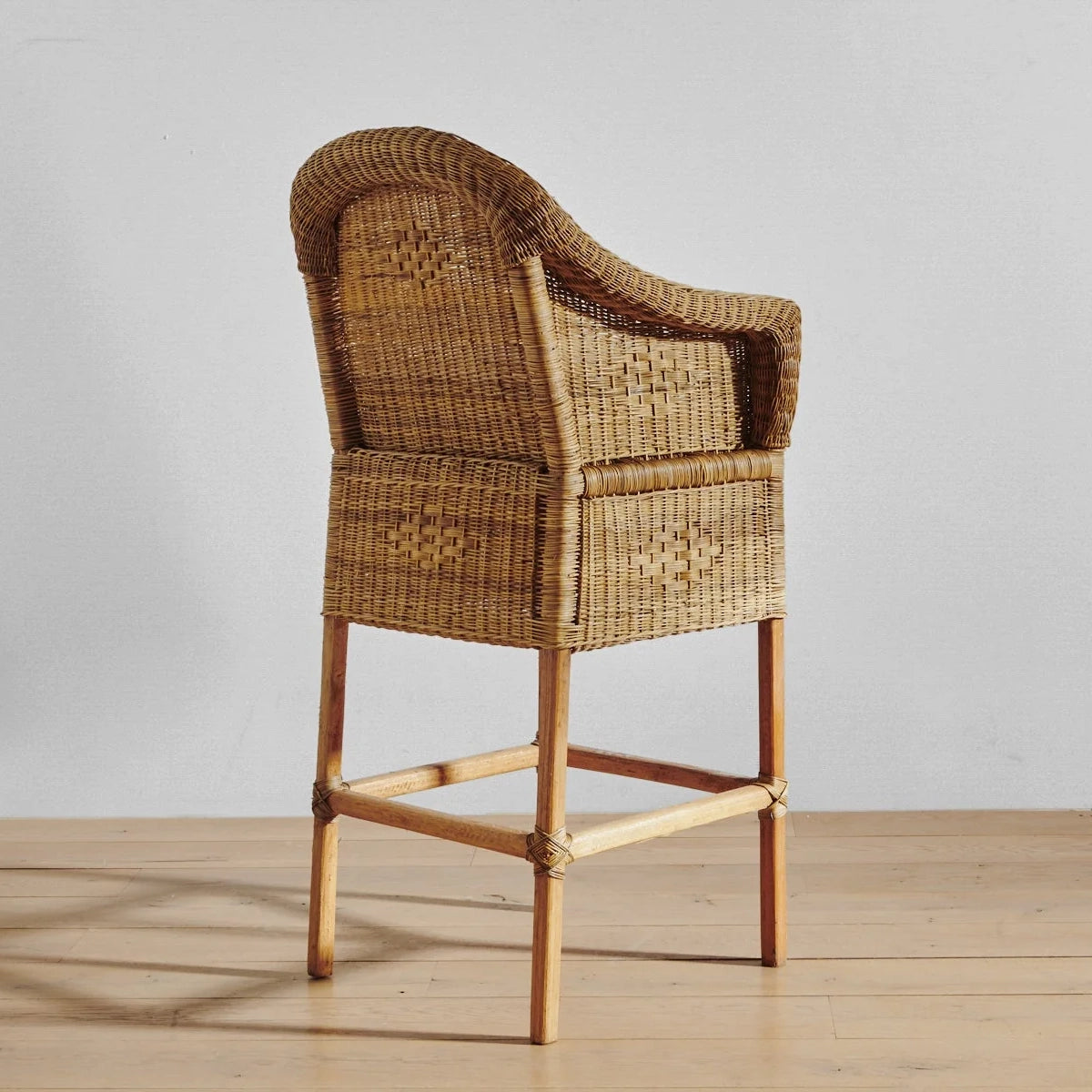 Classic Malawian cane bar stools with natural finishes. Handmade comfort. Authentic, natural tones bring a warm and inviting feel to any space. Close Up