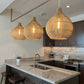 3 Bell shaped Malawi Cane Woven lampshades in a kitchen