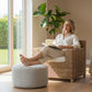 Malawi Furniture - Box Chair Single - Lady relaxing in sun