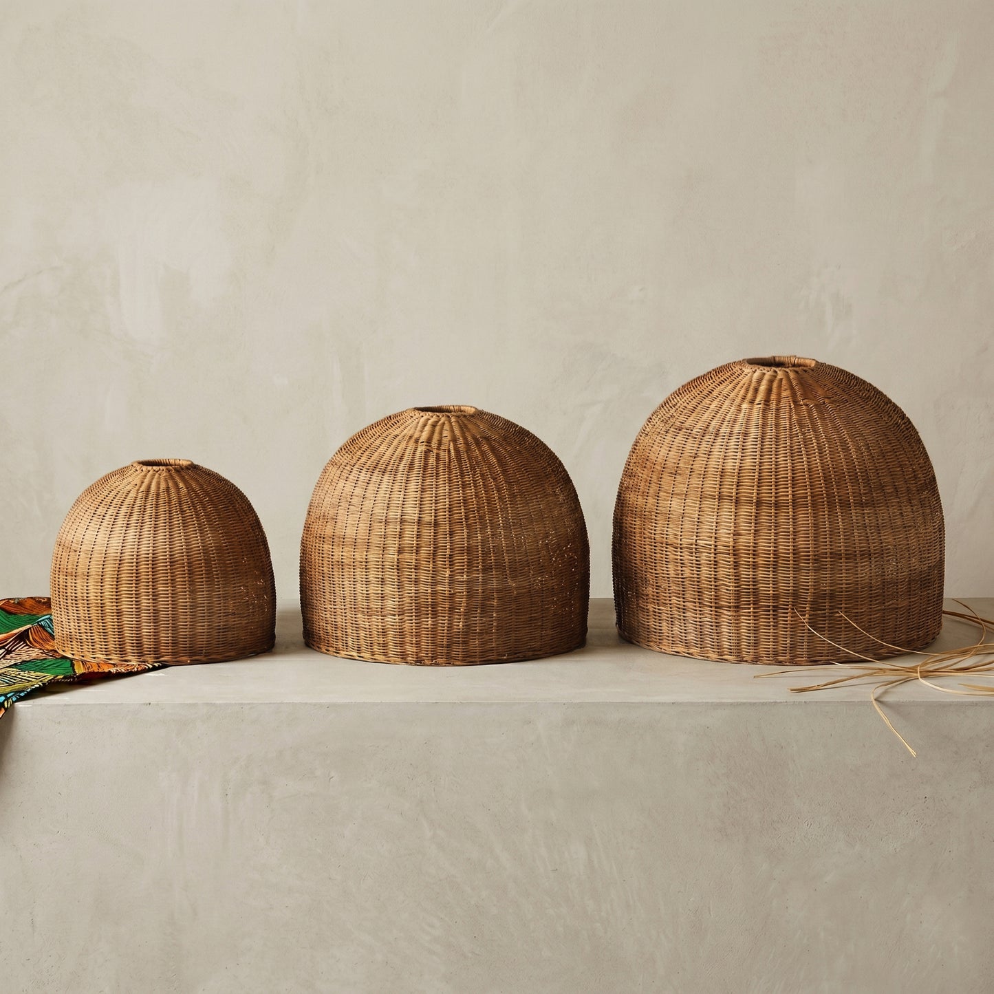 Malawi Furniture woven Malawi cane dome lampshades. Available in 3 different sizes. Creates a beautiful warm and natural ambiance..