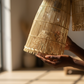 Malawi  Furniture - Fishtrap Pendent Lampshade being held by hand