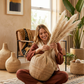 Artisanal authentic hand-woven Garlic Gourd Baskets from Malawi Furniture, a unique and natural storage and decor solution available online in multiple sizes.