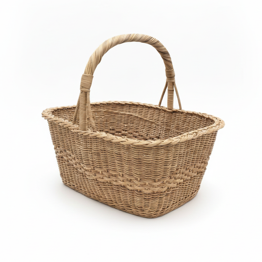 Woven basket with handles on a white background