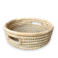 Small artisanal ilala palm round cane trays from Malawi Furniture. Available as singles or a set of 3.
