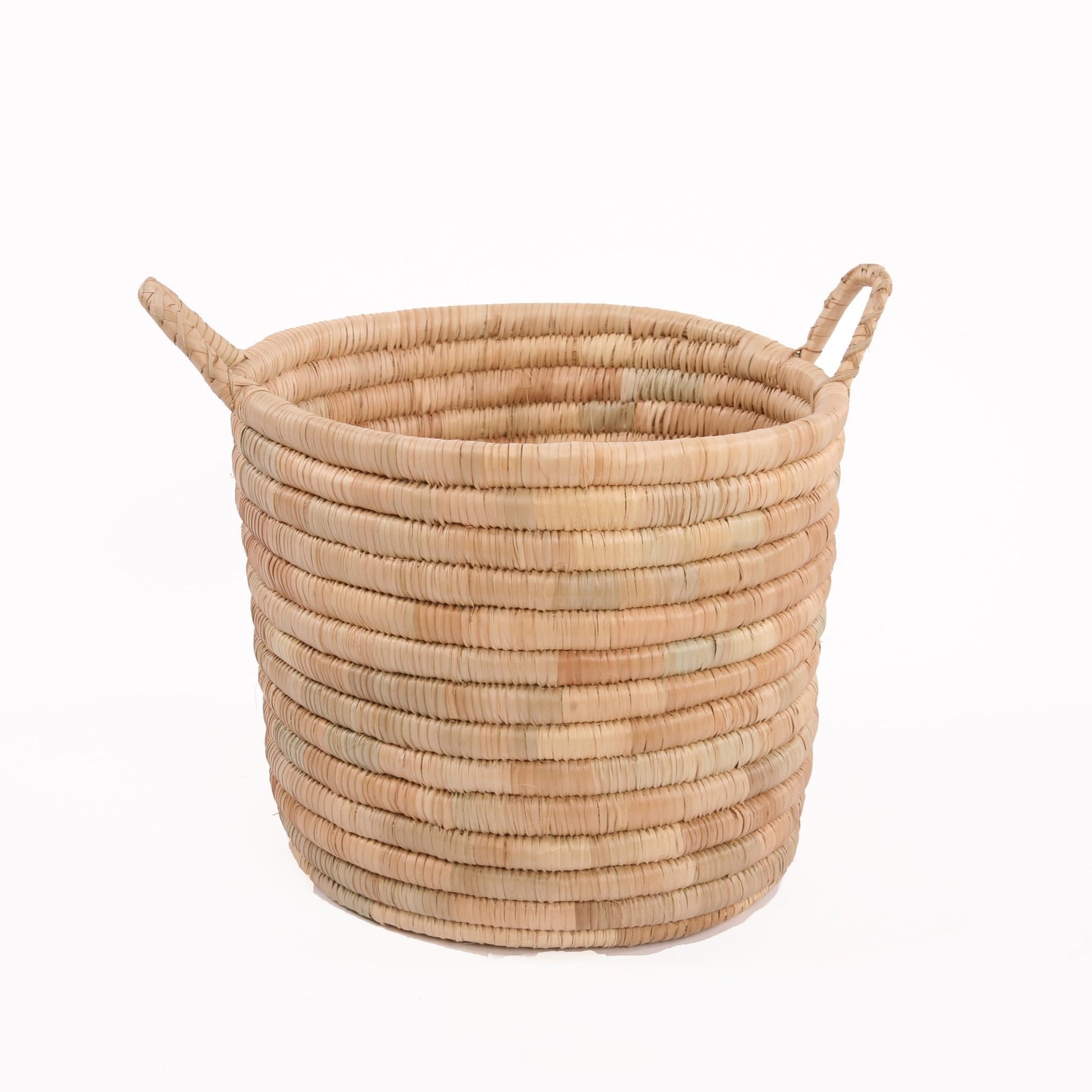 Experience both function and beauty with our Planter Baskets, handwoven from the ilala palm. With a variety of sizes and weave options, you are sure to find the perfect natural storage and container pieces for your home. Whether for blankets, laundry, plants, or toys, these baskets keep your space organised and stylish.