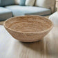 the Buhera Dish elevates any space with its natural charm and functionality. Whether used as a decorative accent or for storage, it adds an organic touch to your home. Perfect for everyday items and throws, displaying on a wall, or holding fruits and vegetables, the Buhera catch-all dish is a stunning addition to your home.