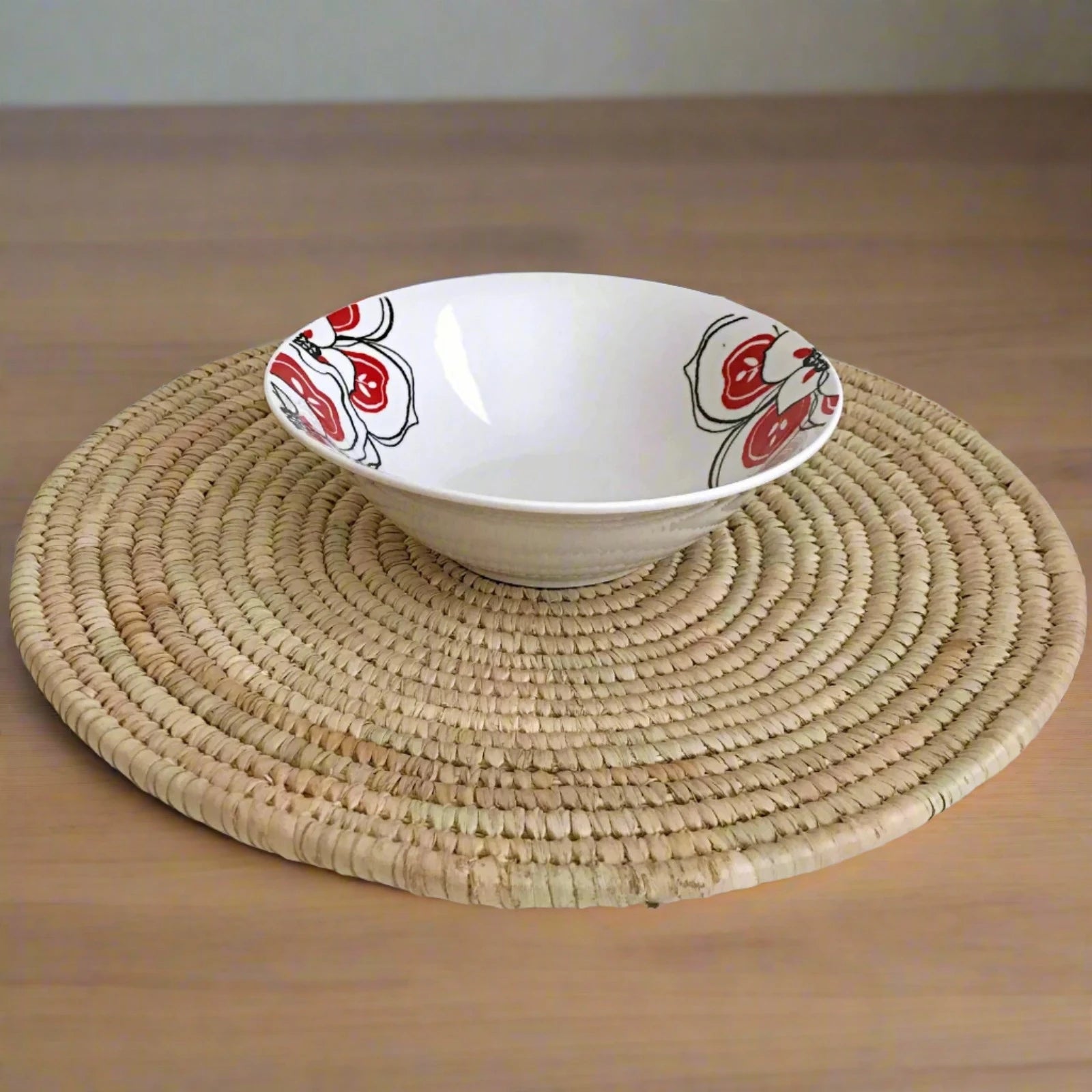 Gorgeous handwoven table placemats that are crafted from cane and water reeds by talented artisans in Malawi, these placemats are sold in a charming set of four. Transport yourself to a world of culinary delights and global inspirations right at your dining table. Embrace exotic flavors, worldly travels, and artistic elegance with every meal. Let your table be a canvas where food, joy, and exploration converge!